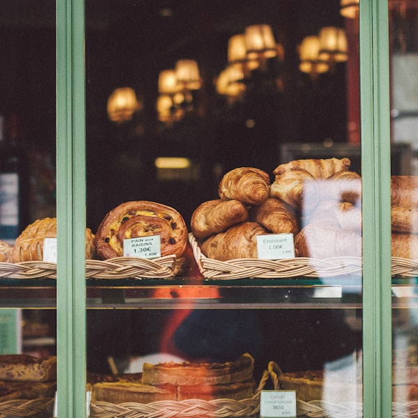 Bread and pastries behind the glass display counter