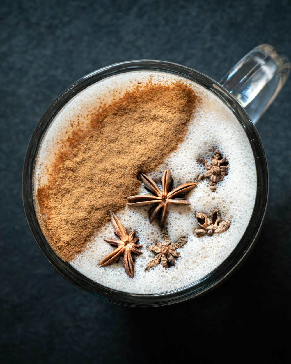 Honey cinnamon latte dusted with cinnamon and finished with star anise