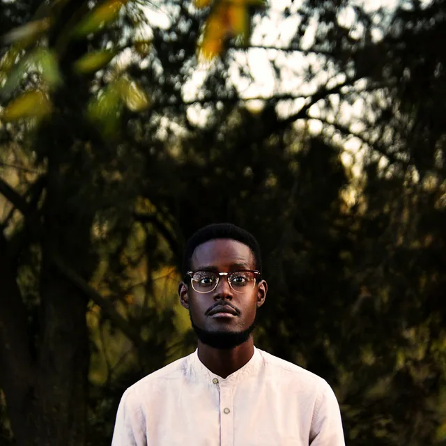 Portrait of the studio's portrait director outdoors