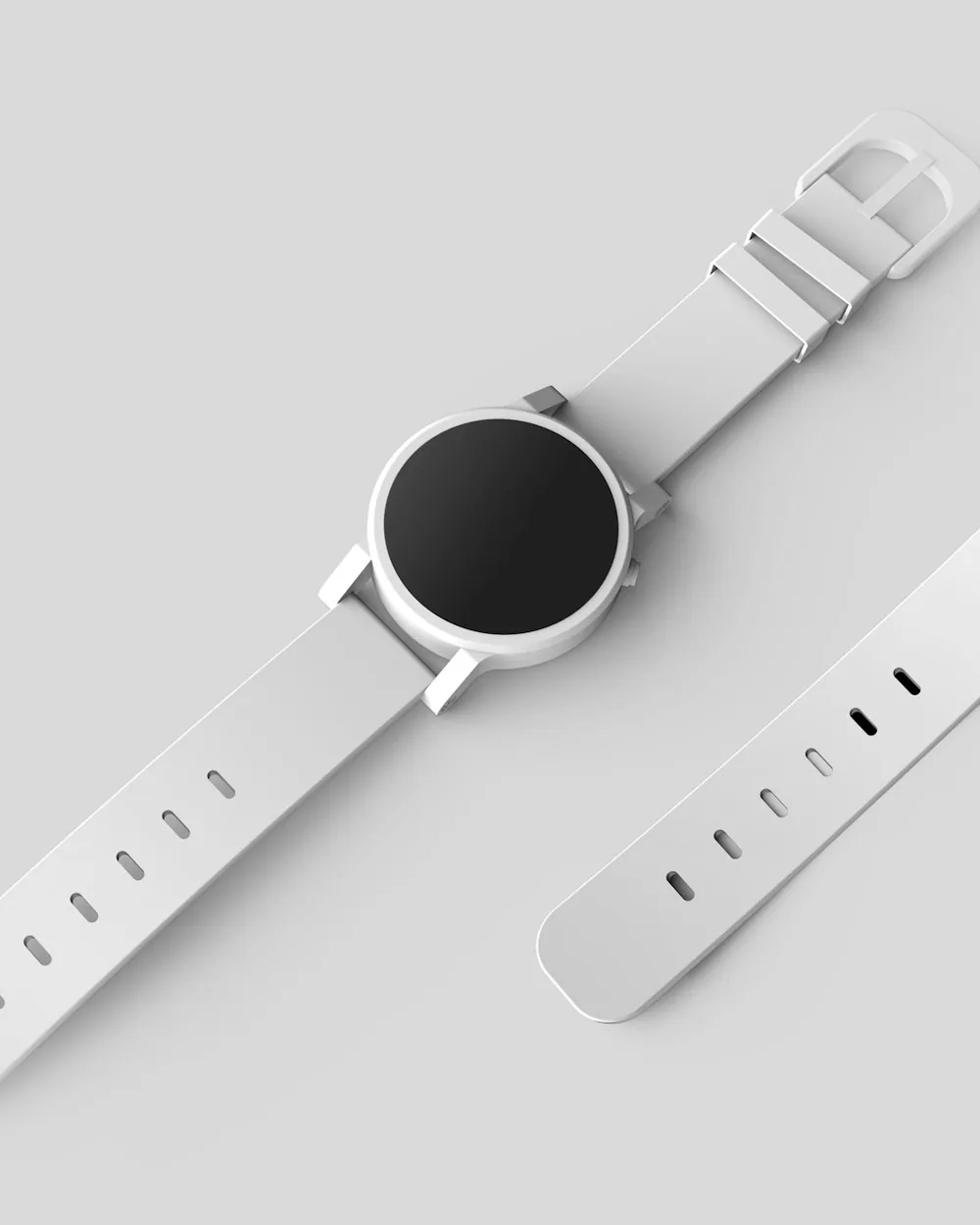 Two minimalist watches arranged on a pale grey surface