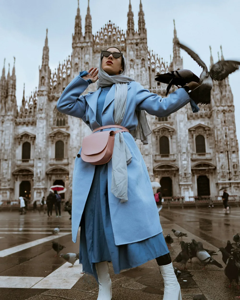 Street-style editorial shot in front of a cathedral facade