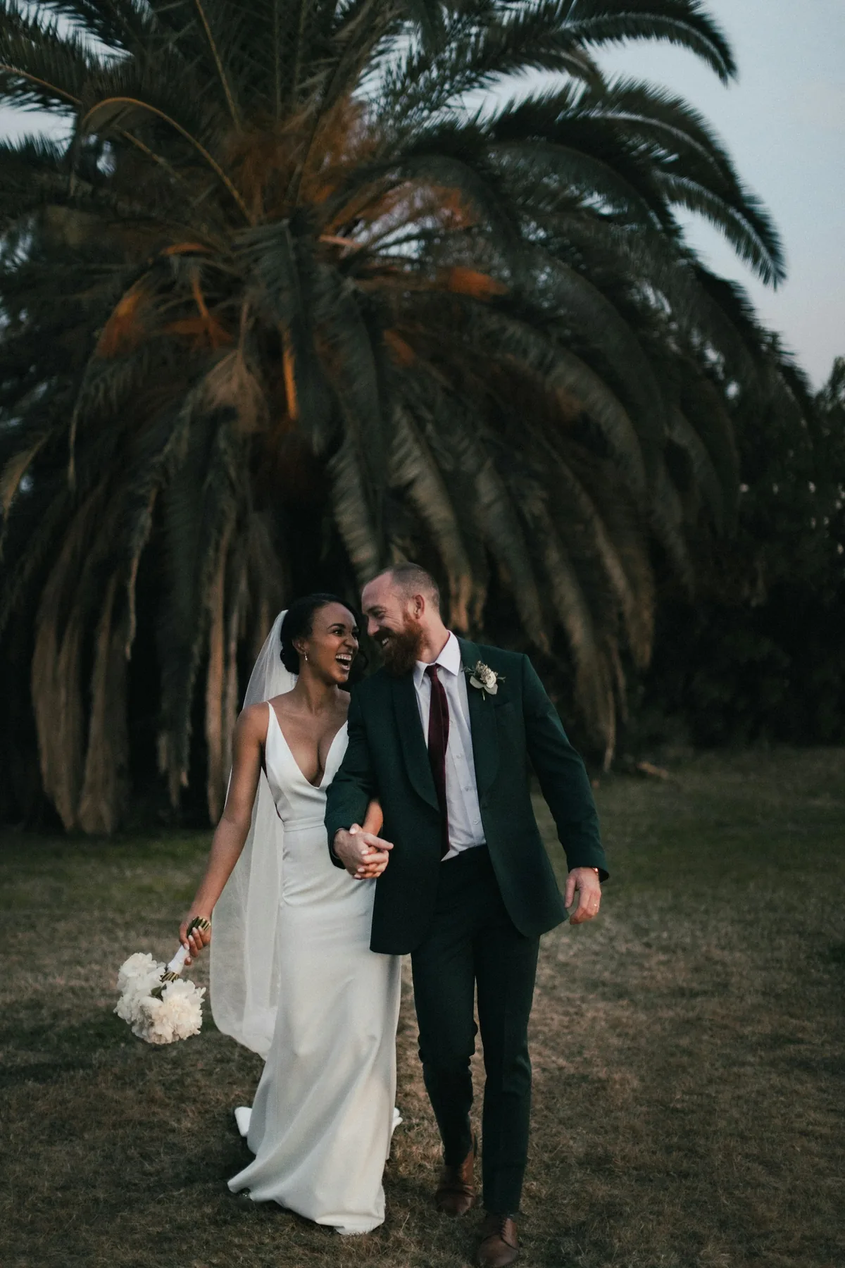 Couple walking together after their ceremony
