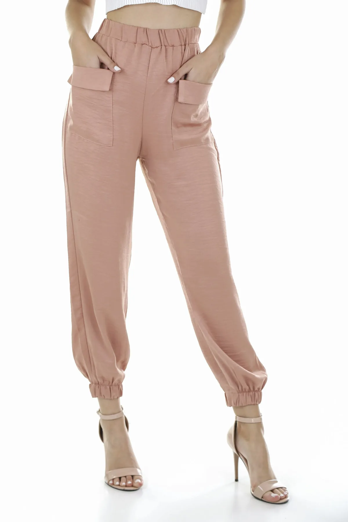 Lookbook still life of trousers and heeled sandals