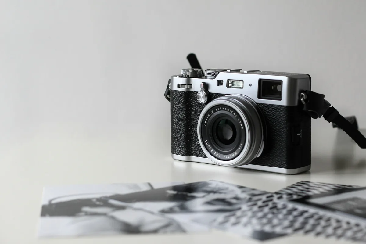 Rangefinder camera resting on a contact sheet