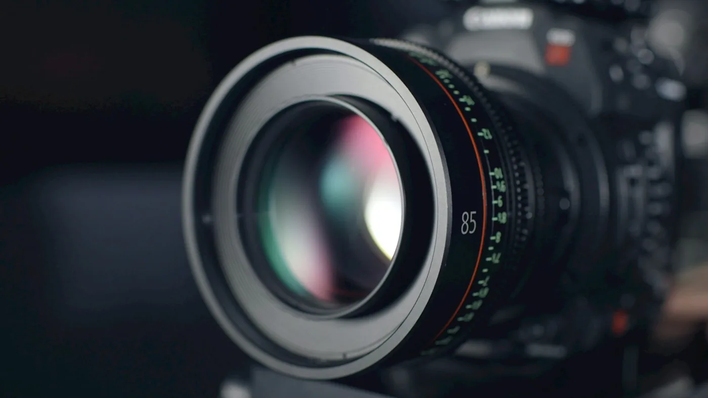 Cinema prime lens catching a rim of studio light