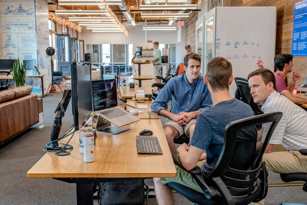 Engineers collaborating on a system design at Nexora Technologies