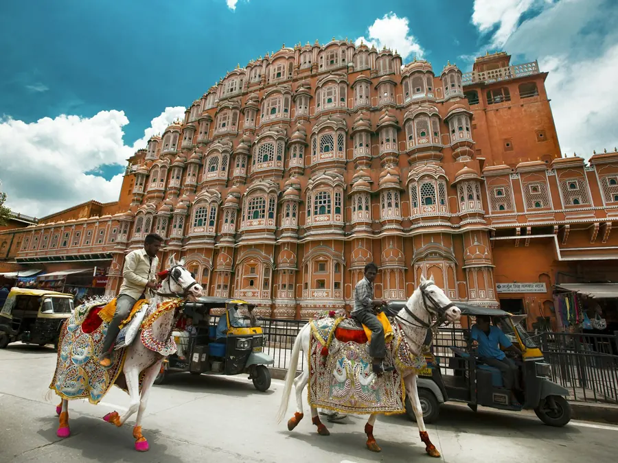 Hawa Mahal facade in Jaipur with street life below