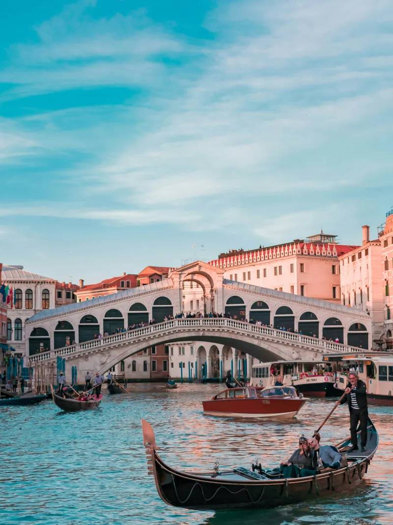 Gondolas and historic buildings on a canal in Venice