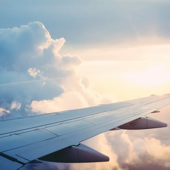 View of clouds from an aircraft window in flight
