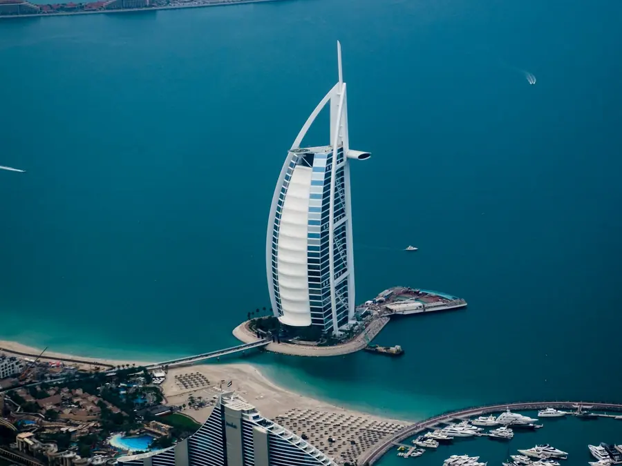 Dubai coastline and landmark hotel from the air