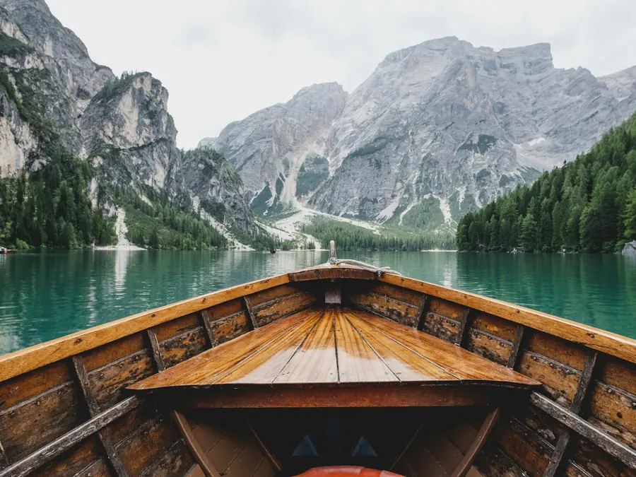 Boat on a glassy alpine lake in Switzerland